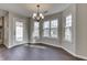 Bright dining area with hardwood floors and view to backyard at 1168 Oak Leaf Rd, Franklin, IN 46131