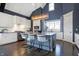 Spacious kitchen with granite island, stainless steel appliances, and white cabinetry at 16334 River Crest Ct, Westfield, IN 46062