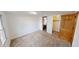 Bright bedroom with neutral walls, carpet, and a large window at 172 Timberline Dr, Cicero, IN 46034