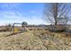 Backyard playground equipment with wooden deck on grassy lawn at 17849 Grassy Knoll Dr, Westfield, IN 46074