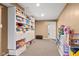 Basement play area featuring shelving, toy storage, and ample space at 17849 Grassy Knoll Dr, Westfield, IN 46074