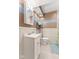 White bathroom vanity, toilet, and shower with blue accent wall at 17849 Grassy Knoll Dr, Westfield, IN 46074