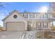 Two-story home with a front porch and attached garage at 17849 Grassy Knoll Dr, Westfield, IN 46074