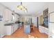 Bright kitchen with island, lots of cabinets, and stainless steel appliances at 17849 Grassy Knoll Dr, Westfield, IN 46074