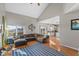 Open-concept living room with vaulted ceilings and view of the kitchen at 17849 Grassy Knoll Dr, Westfield, IN 46074
