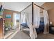 Large main bedroom with canopy bed, carpeted floors, and natural light at 17849 Grassy Knoll Dr, Westfield, IN 46074