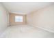 Spacious bedroom with neutral walls and plush carpeting at 18272 Kinder Oak Dr, Noblesville, IN 46062