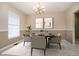 Elegant dining room with round table and neutral decor at 18272 Kinder Oak Dr, Noblesville, IN 46062