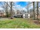 House exterior showcasing a well-maintained lawn and driveway at 2025 Hamilton Ln, Carmel, IN 46032