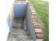 Exterior basement entrance with concrete steps and brick accents at 3235 Adams St, Indianapolis, IN 46218