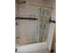 Updated bathroom with subway tile shower and modern vanity at 3235 Adams St, Indianapolis, IN 46218