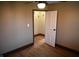 Bedroom with wood-look floors, ceiling fan, and closet at 3235 Adams St, Indianapolis, IN 46218