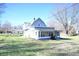 House exterior with screened porch and walkway at 3235 Adams St, Indianapolis, IN 46218