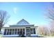 House exterior with screened porch and landscaping at 3235 Adams St, Indianapolis, IN 46218