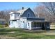 Charming two-story home with a screened porch and large yard at 3235 Adams St, Indianapolis, IN 46218