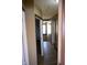 Hallway with wood floors and access to other rooms at 3235 Adams St, Indianapolis, IN 46218