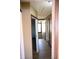 Hallway with wood floors and access to other rooms at 3235 Adams St, Indianapolis, IN 46218