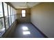 Bright screened porch with ceiling fan and window at 3235 Adams St, Indianapolis, IN 46218