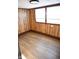 Simple spare room with wood-look flooring and ceiling fan at 3235 Adams St, Indianapolis, IN 46218