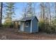 Blue storage shed with covered porch at 3340 N Franklin Rd, Indianapolis, IN 46226