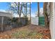 Backyard with a chain link fence and shed at 355 Mcclure Rd, Columbus, IN 47201