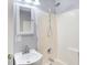 Simple bathroom with a shower/tub, sink, and linen storage at 355 Mcclure Rd, Columbus, IN 47201