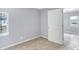 Spacious bedroom with neutral walls and carpet at 355 Mcclure Rd, Columbus, IN 47201