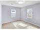 Spacious bedroom with neutral walls and new carpet at 355 Mcclure Rd, Columbus, IN 47201