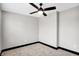 Simple bedroom with ceiling fan and neutral wall colors at 416 Eastern Ave, Indianapolis, IN 46201