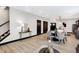 Open concept dining area with modern table and chairs, adjacent to kitchen at 416 Eastern Ave, Indianapolis, IN 46201