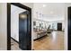 Open concept kitchen with island, dark countertops, and modern lighting at 416 Eastern Ave, Indianapolis, IN 46201