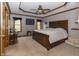 Large bedroom with carpeted floors, a sizable bed, and ample closet space at 4639 Byrkit St, Indianapolis, IN 46221