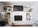 White brick fireplace with ornate mantel and decorative mirrors at 6520 Cricklewood Rd, Indianapolis, IN 46220