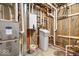 Unfinished basement with HVAC and water softener at 7650 Clarion Dr, Indianapolis, IN 46236