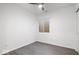 Simple basement bedroom with dark gray floors and a ceiling fan at 7650 Clarion Dr, Indianapolis, IN 46236