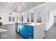 Modern kitchen with blue cabinetry, island, and stainless steel appliances at 7650 Clarion Dr, Indianapolis, IN 46236