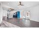 Modern open concept kitchen and living area with blue cabinetry at 7650 Clarion Dr, Indianapolis, IN 46236