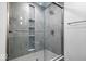 Clean shower with glass enclosure and mosaic tile accents at 7650 Clarion Dr, Indianapolis, IN 46236