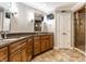 Elegant bathroom with double vanity, granite countertops, and a large walk-in shower at 7885 Clearwater Pkwy, Indianapolis, IN 46240