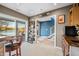 Finished basement bar with sliding glass doors to the backyard at 9454 Raintree S Dr, Columbus, IN 47201