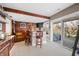Basement bar with a custom-made bar top and seating at 9454 Raintree S Dr, Columbus, IN 47201