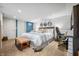 Spacious basement bedroom with a comfortable bed and built-in workspace at 9454 Raintree S Dr, Columbus, IN 47201