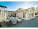 Large deck with comfortable seating and a patio heater at 9454 Raintree S Dr, Columbus, IN 47201