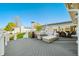 Spacious deck with outdoor seating and a fire pit at 9454 Raintree S Dr, Columbus, IN 47201