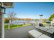 Relaxing deck overlooking the lake with outdoor furniture at 9454 Raintree S Dr, Columbus, IN 47201