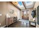 Bright and spacious entryway with skylights and wood flooring at 9454 Raintree S Dr, Columbus, IN 47201