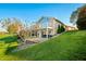 Lakefront home with a large deck and walkout basement at 9454 Raintree S Dr, Columbus, IN 47201