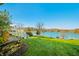 Stunning view of the lake from the backyard at 9454 Raintree S Dr, Columbus, IN 47201
