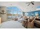 Spacious living room with stunning lake views and comfortable sectional sofa at 9454 Raintree S Dr, Columbus, IN 47201