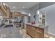 Well-equipped kitchen with island, granite countertops, and stainless steel appliances at 1006 Amesbury Ct, Indianapolis, IN 46217